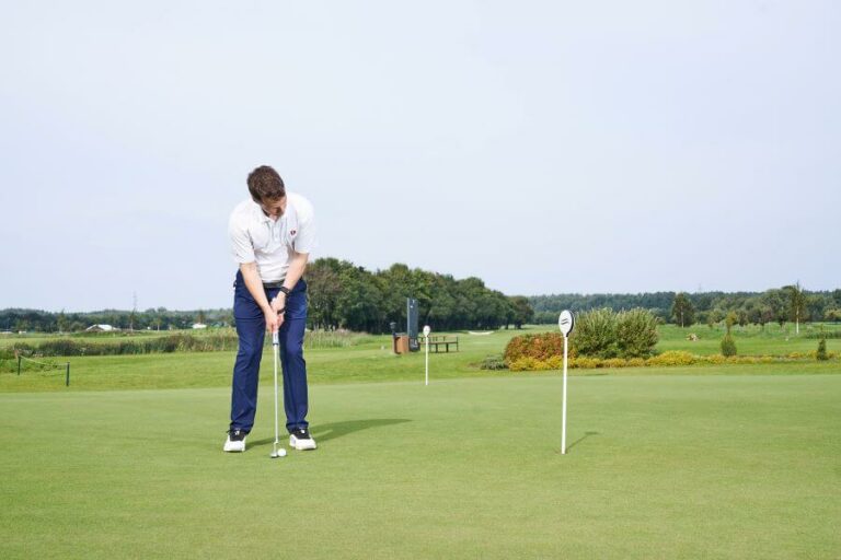 golf player training putting