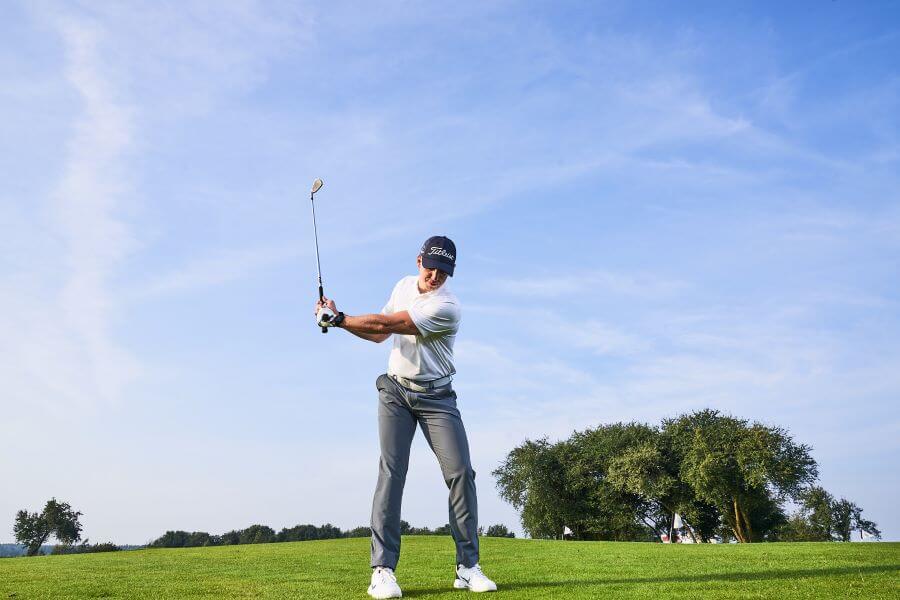 golfer position at the top of the backswing