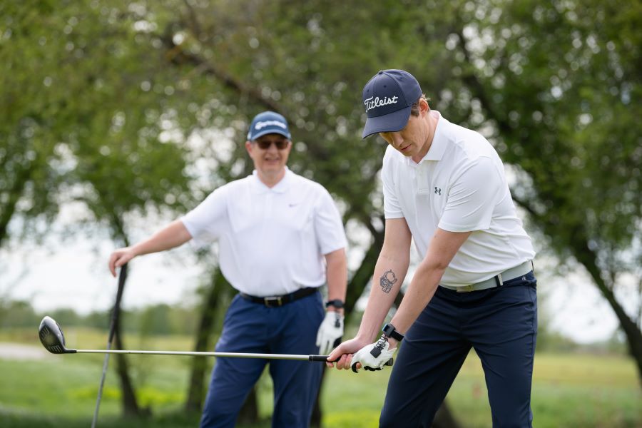 golfer ready to hit with driver